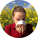 Photo of person affected by allergic symptoms of seasonal pollen